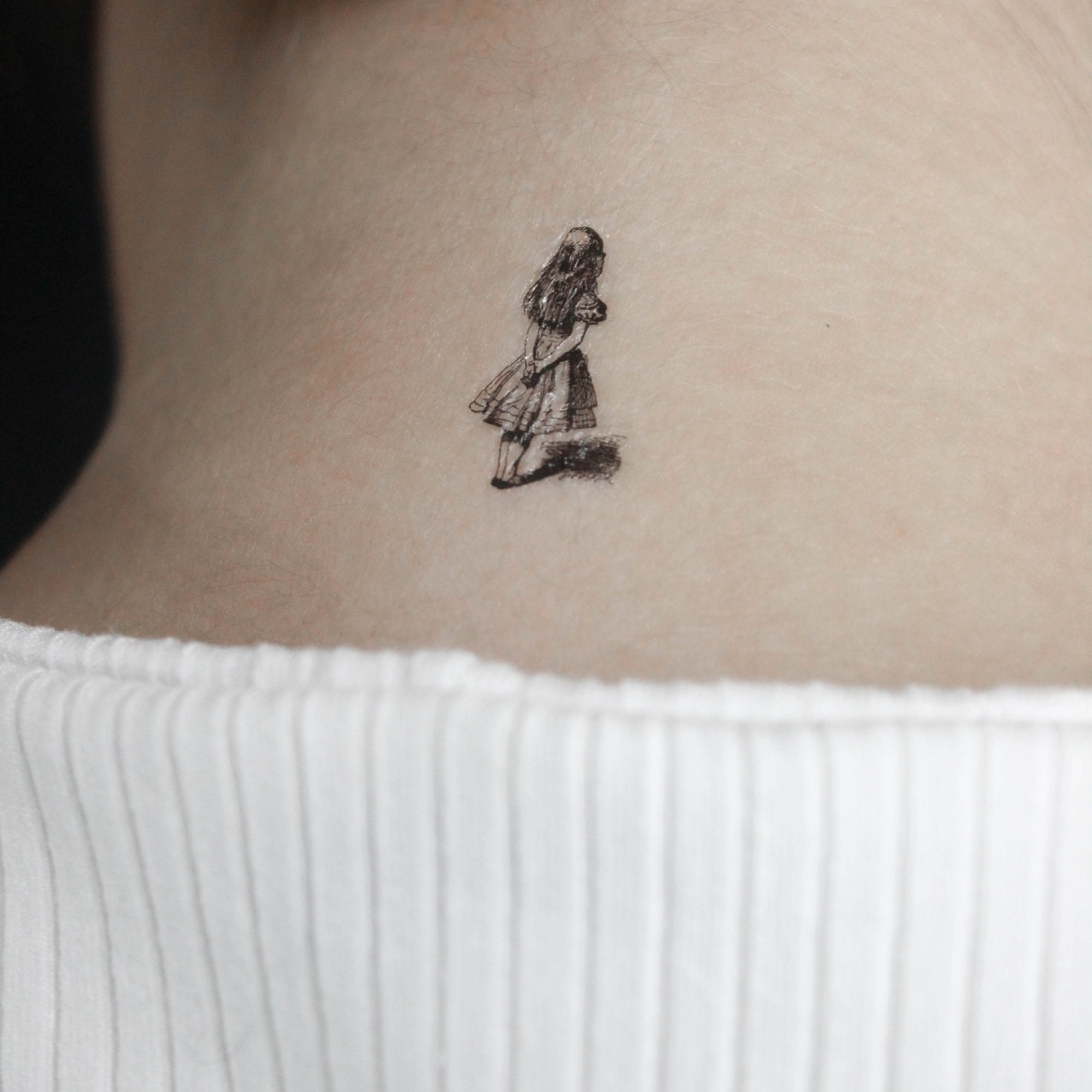 Alice in Wonderland tattoos for men 0093