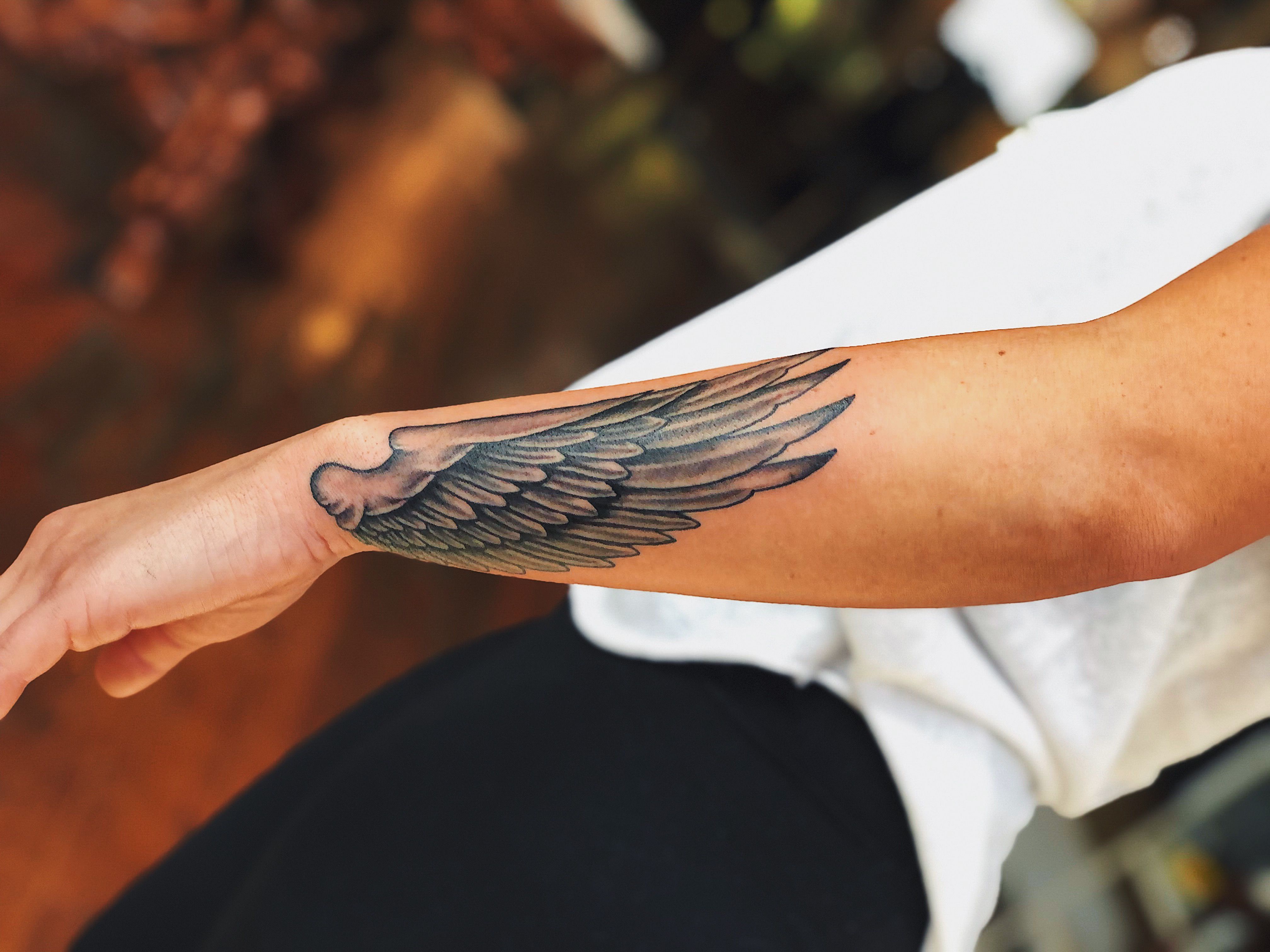 angel wing tattoos for men