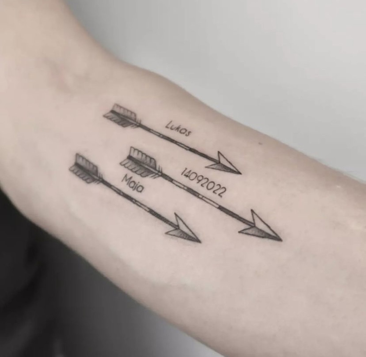 arrow tattoos for men symbolism.