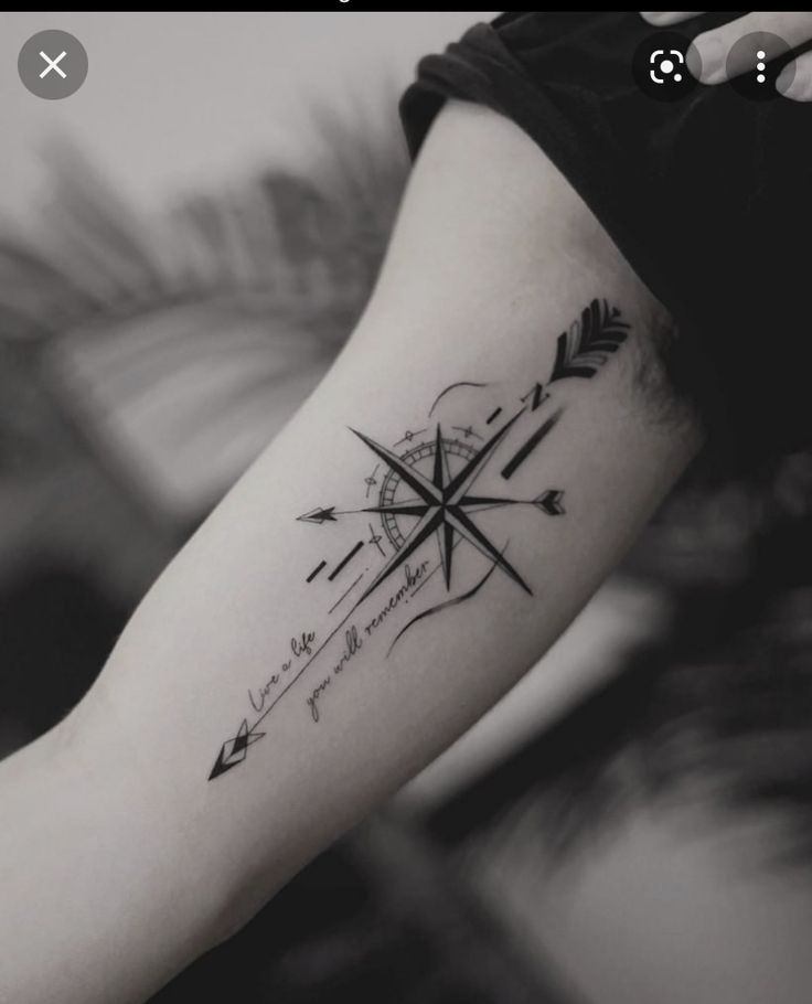 arrow with compass tattoo designs for men 0012