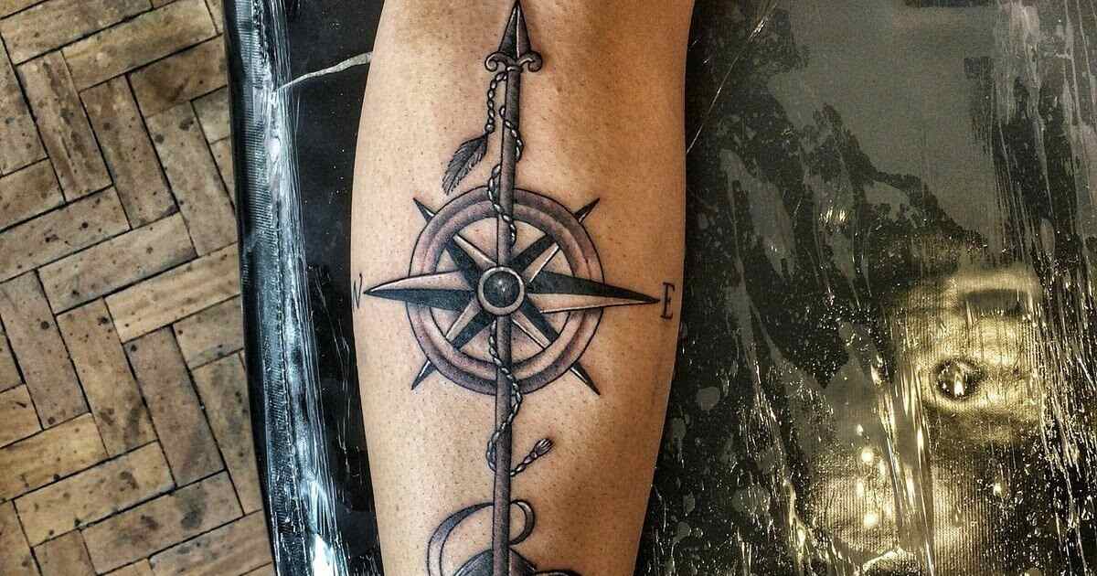 arrow with compass tattoo designs for men 0017