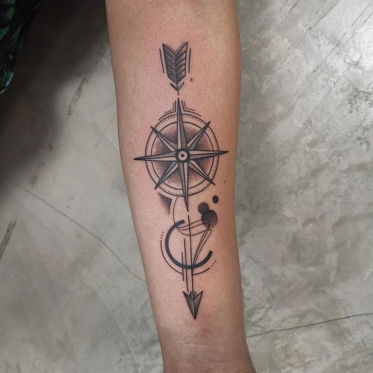 arrow with compass tattoo designs for men 0099