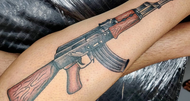 artistic ak 47 tattoos for men interpretations