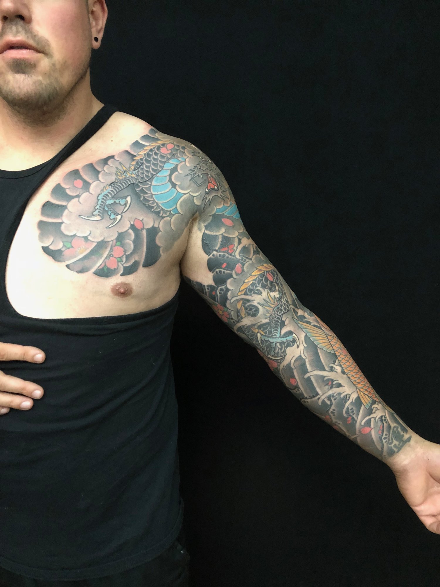 artistic expression in Japanese arm tattoos for men.