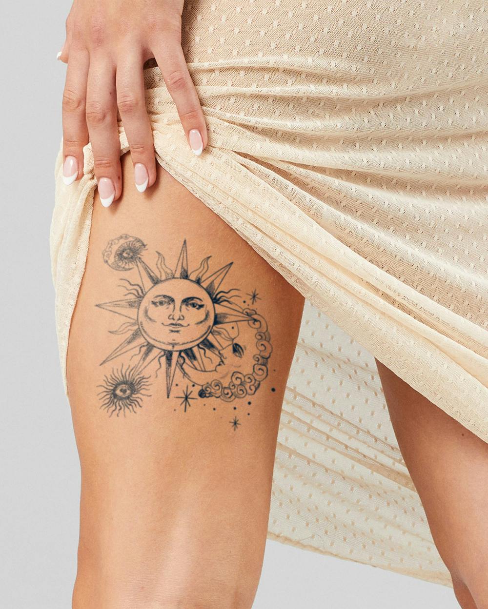 artistic sun and moon tattoos for men