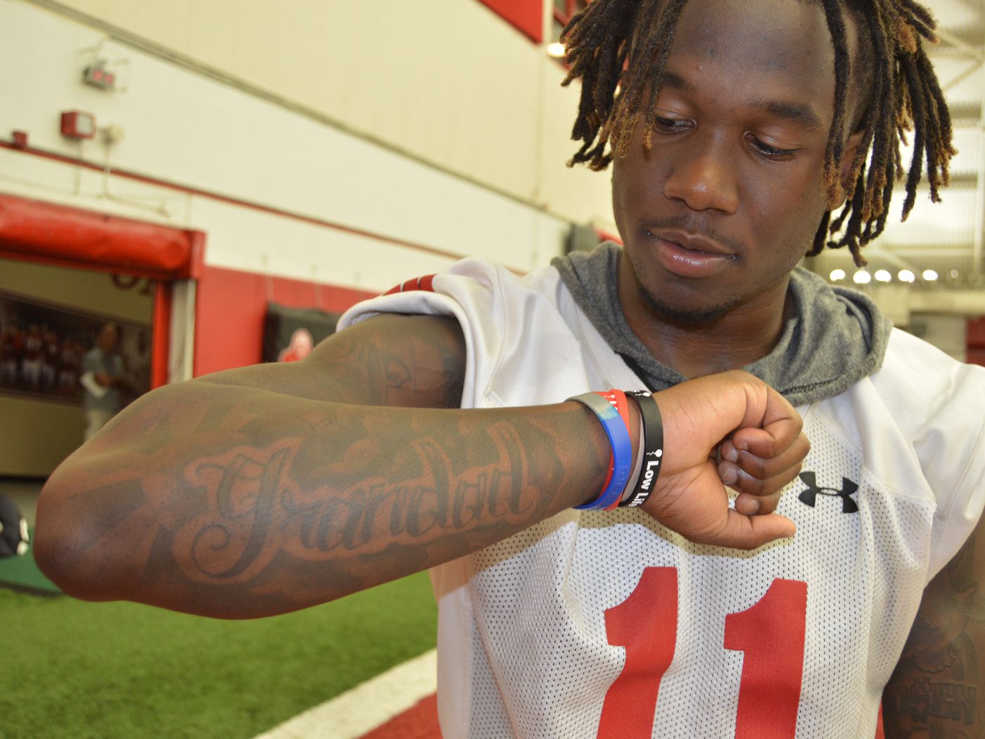 artistic tattoos for men with a football passion.