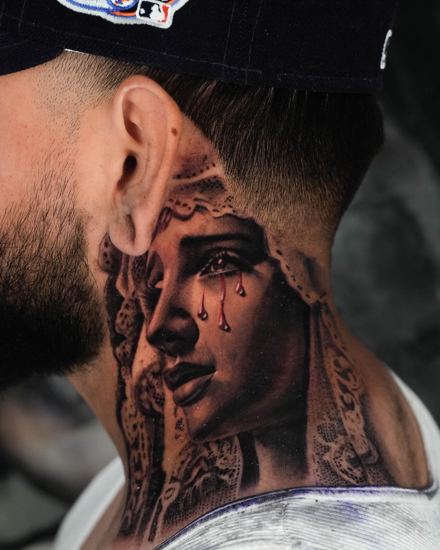 artistic throat tattoos for men