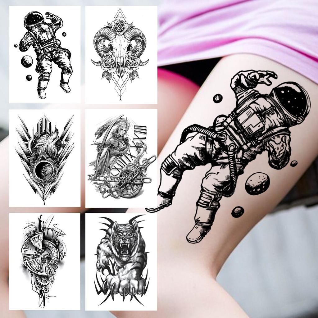 astronaut themed tattoos for men