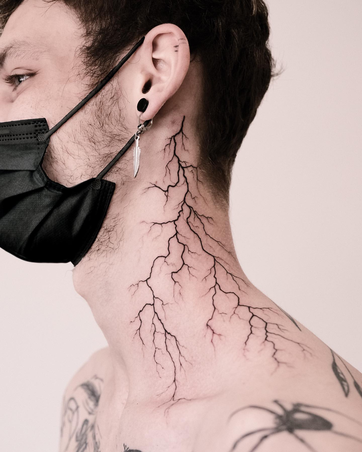 back of neck tattoos for men 0064