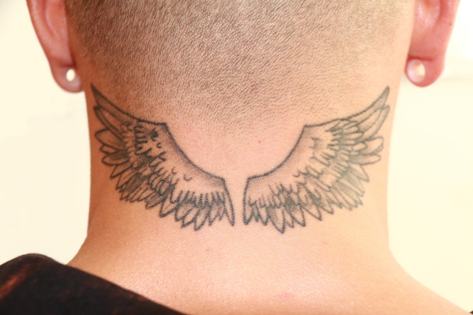 back of neck tattoos for men 0069