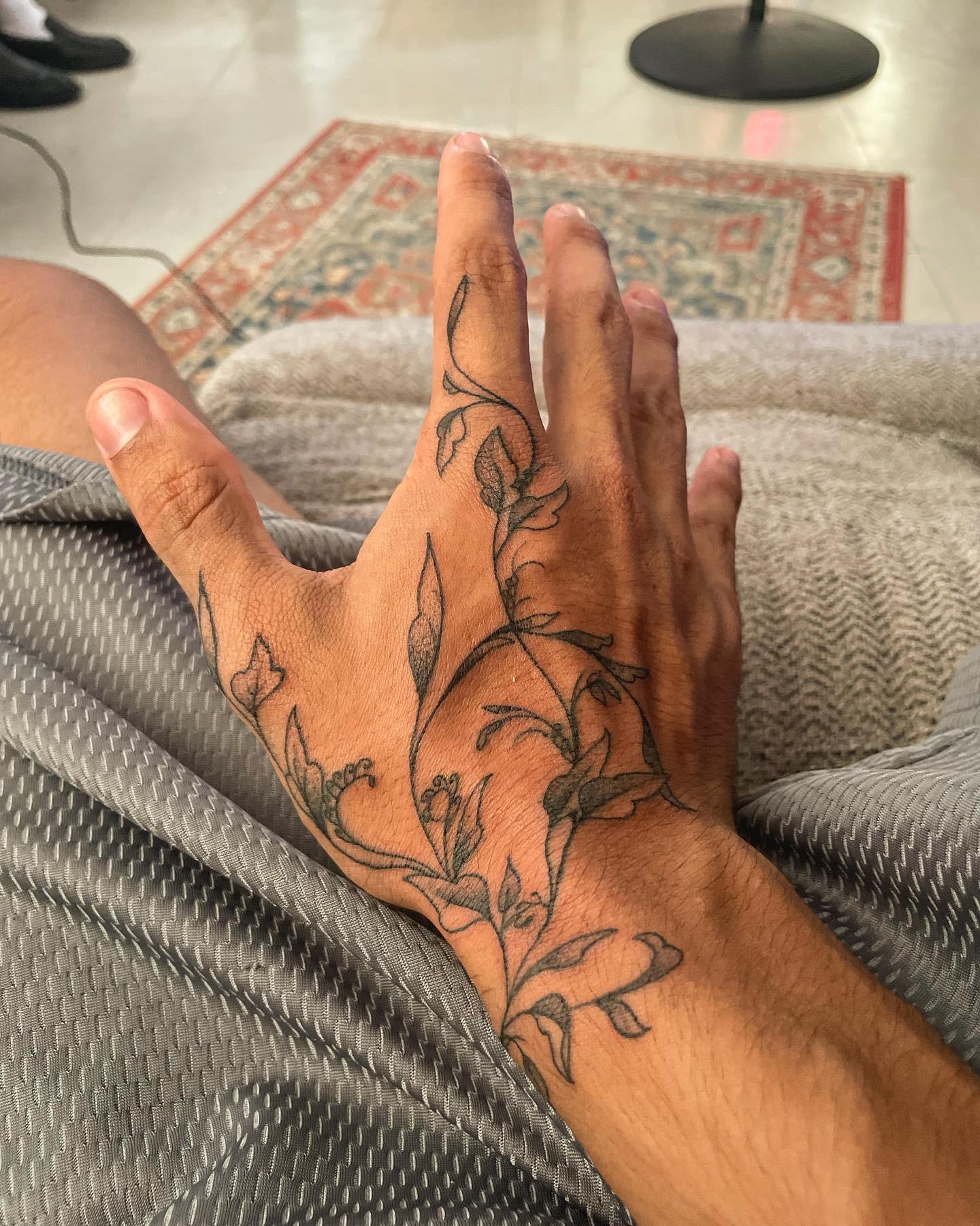 back of the hand tattoos for men placement tips