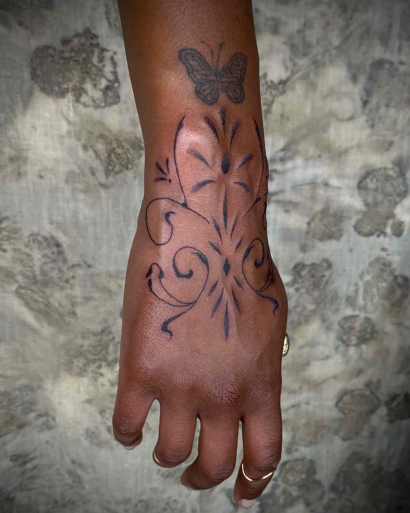 back of the hand tattoos for men 0080