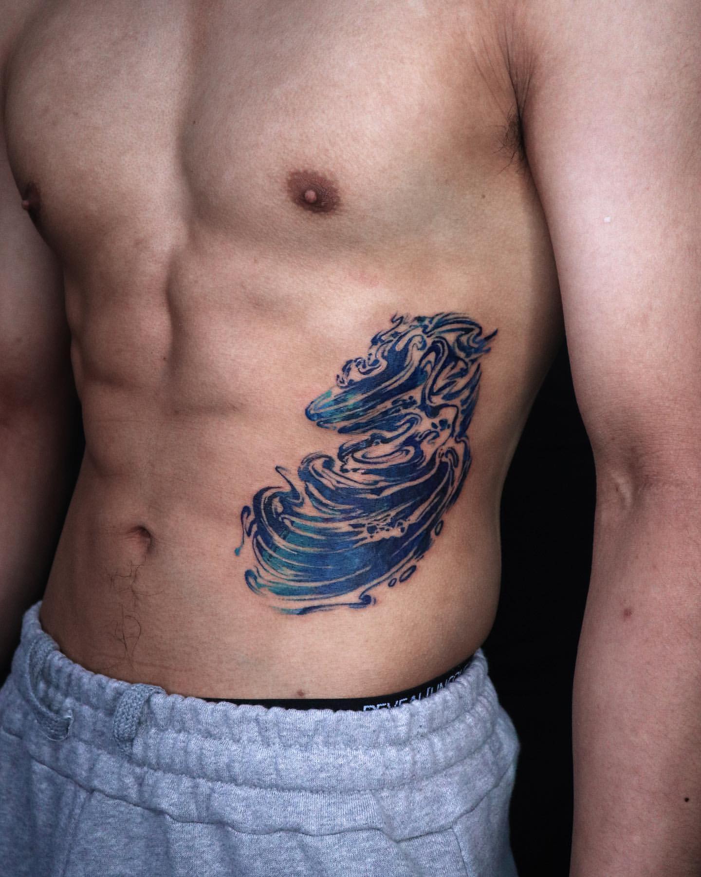 best rib tattoos for men