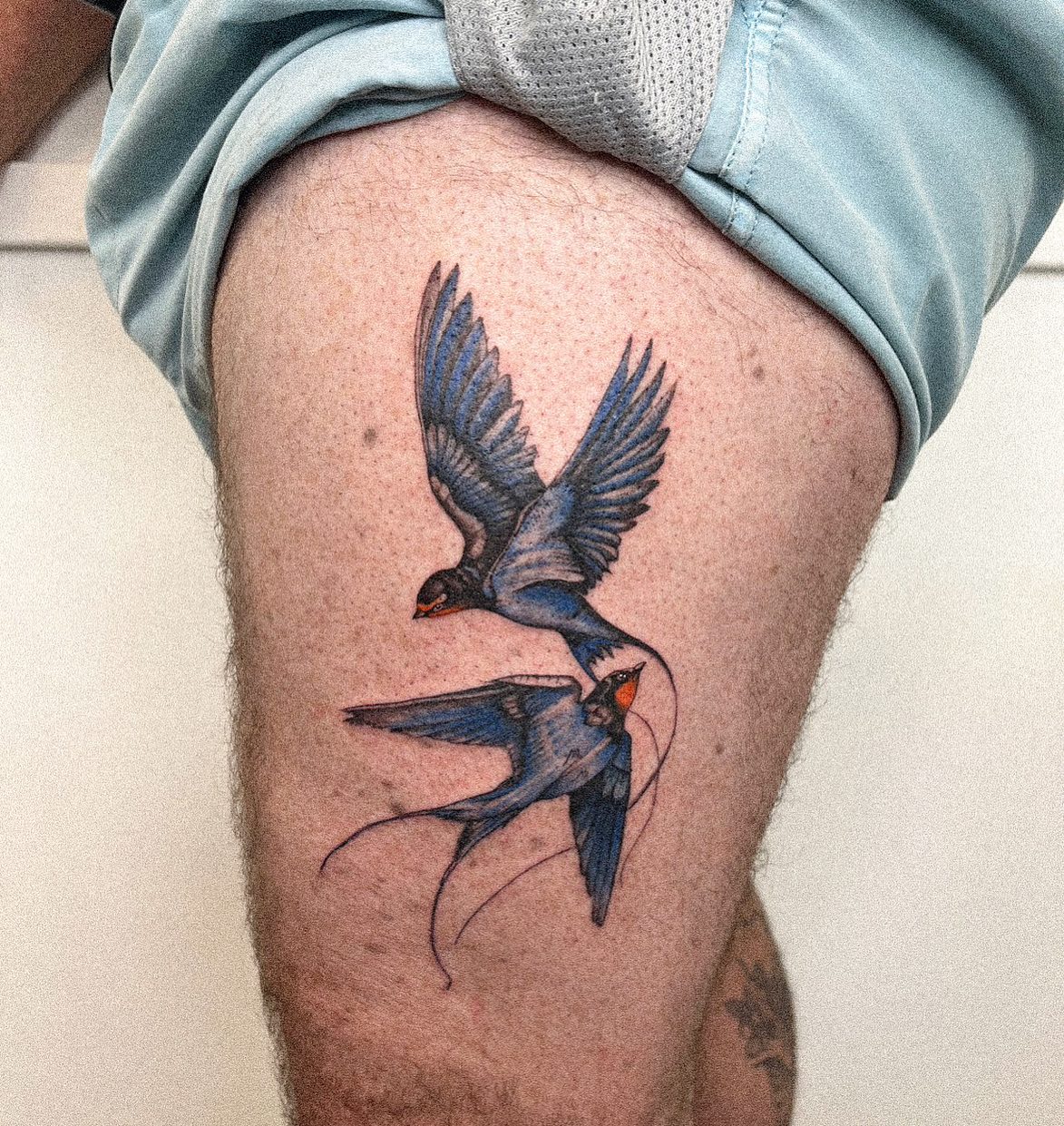 bird themed tattoos for men.