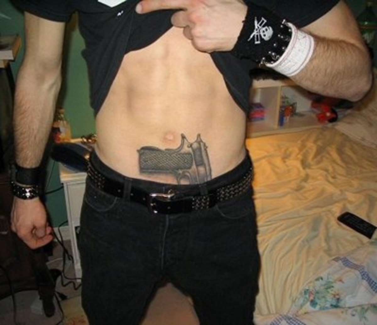 black and gray gun tattoos for men