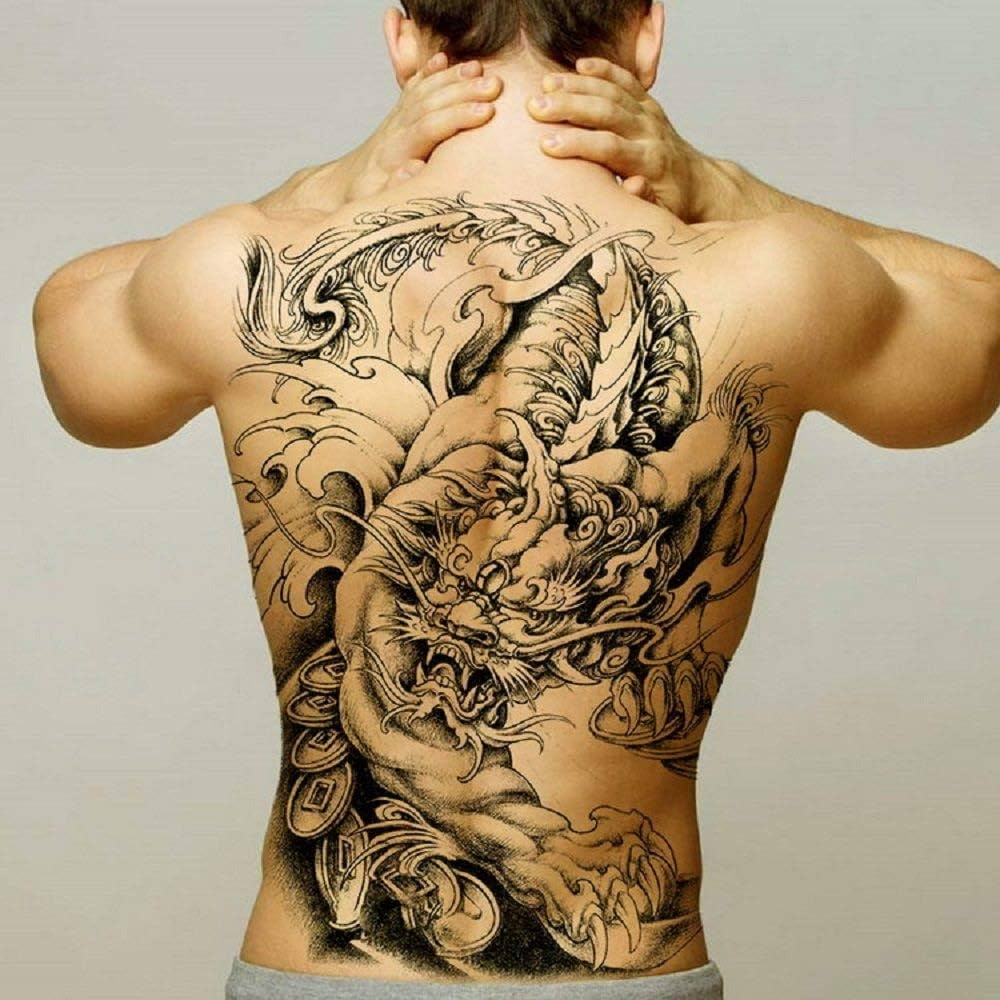 black and grey dragon tattoos for men's back