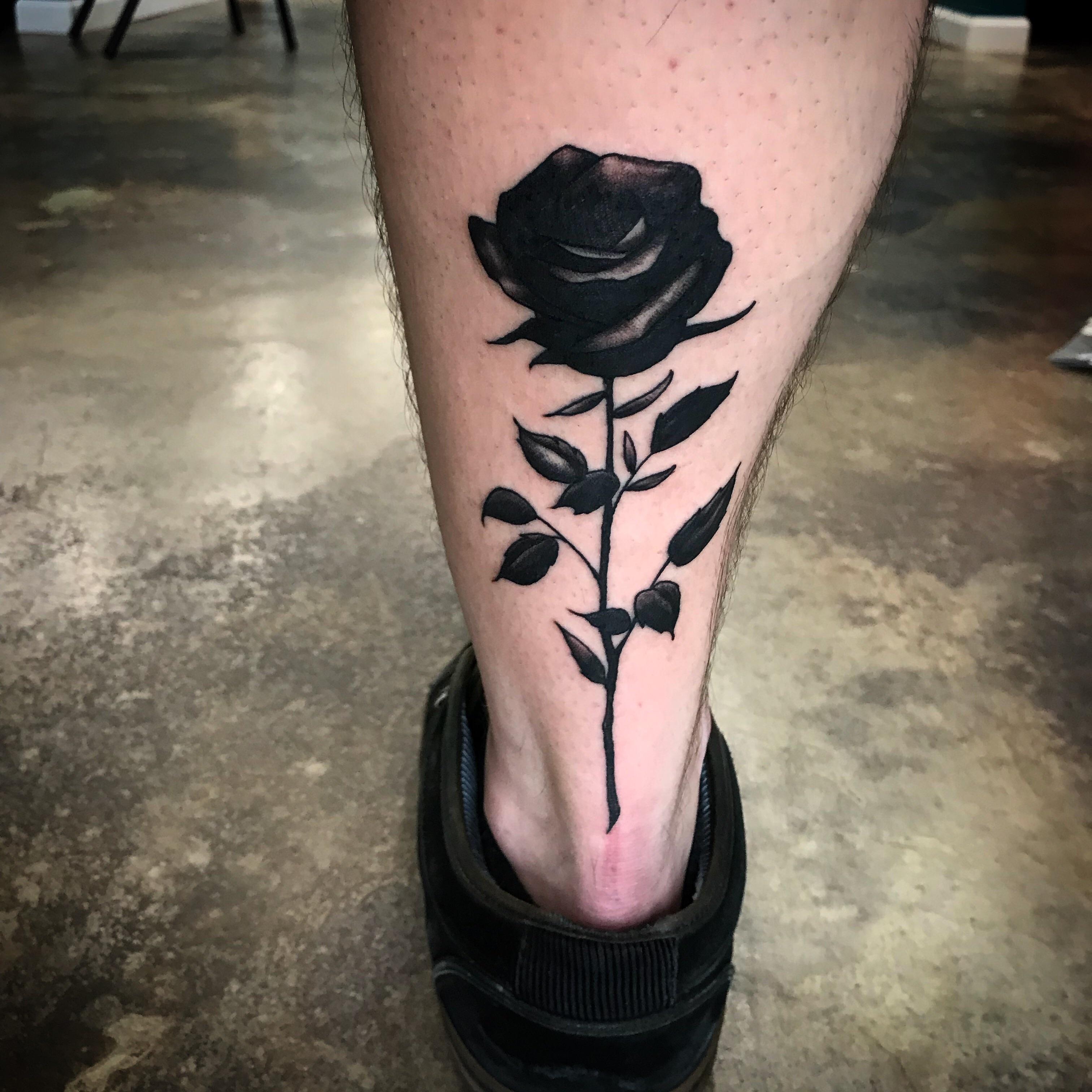 black rose tattoo meaning for men