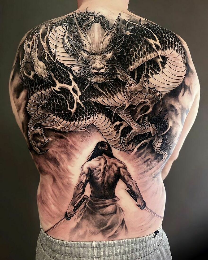 bold dragon tattoos for men's back