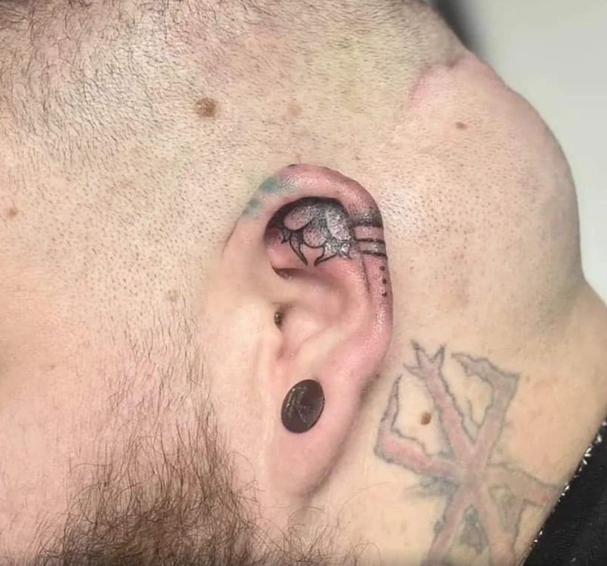 bold ear tattoos for men concepts