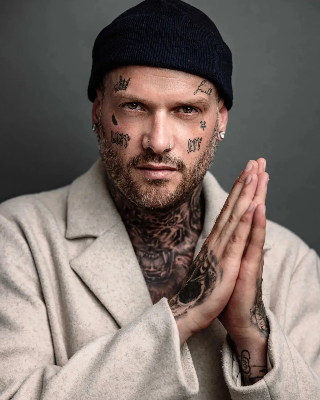 bold face tattoos for men trends