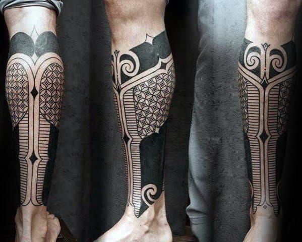 bold geometric tattoos for men