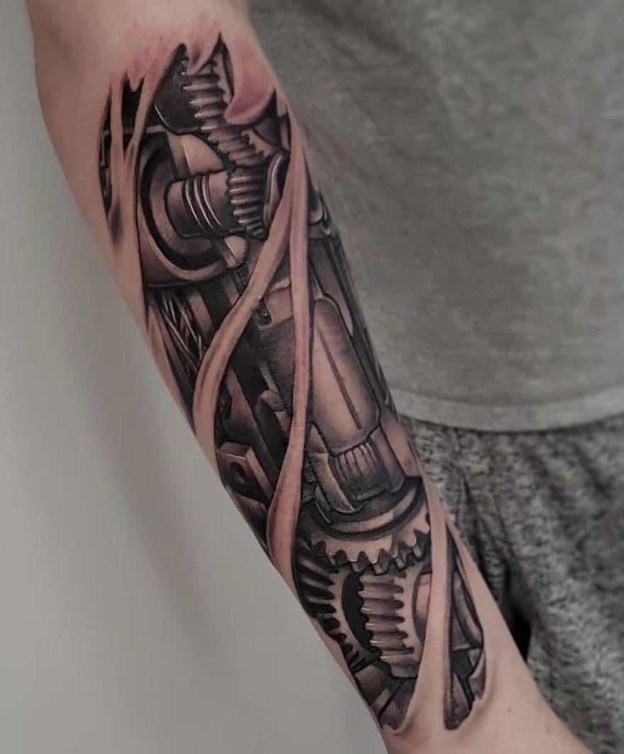 bold mechanic tattoos for men