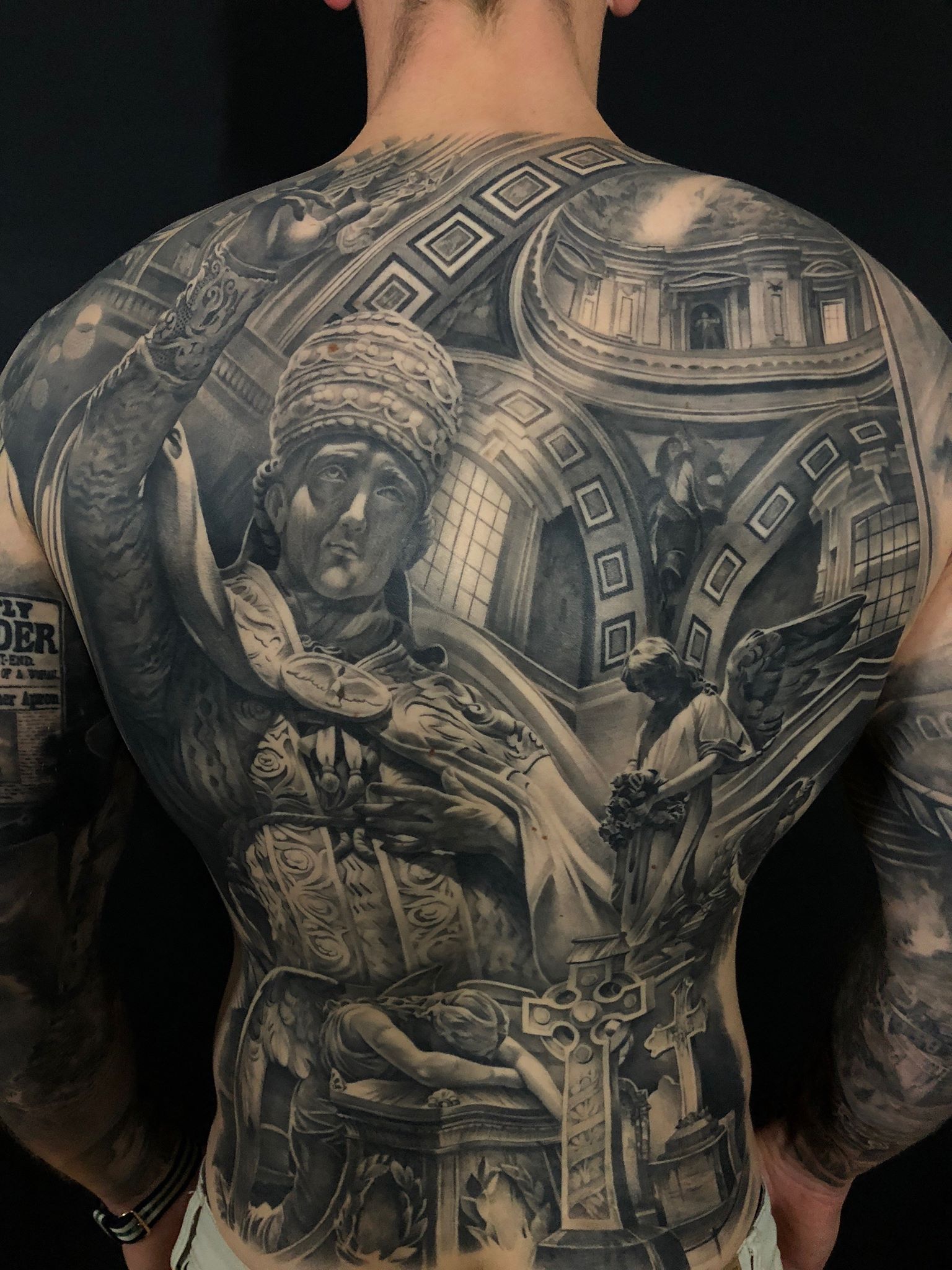 bold religious tattoos for men