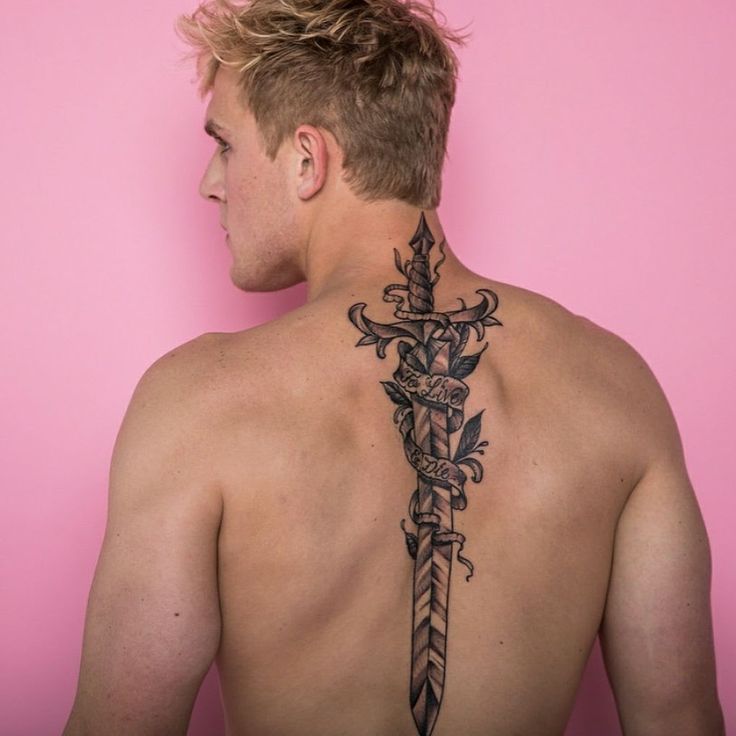 bold sword back tattoos for men