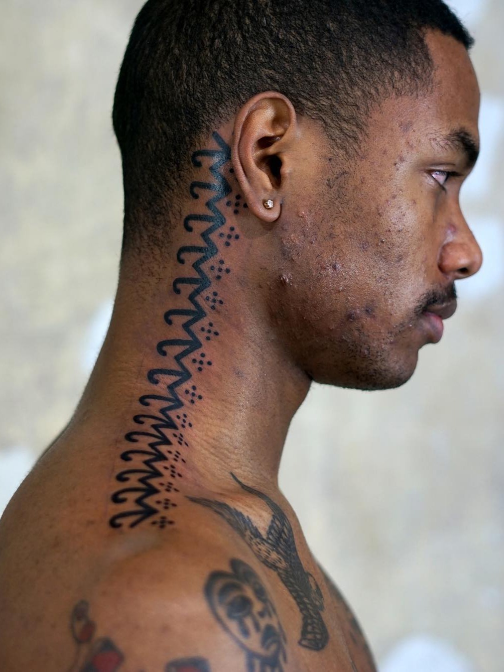 bold tattoo styles for dark skin men