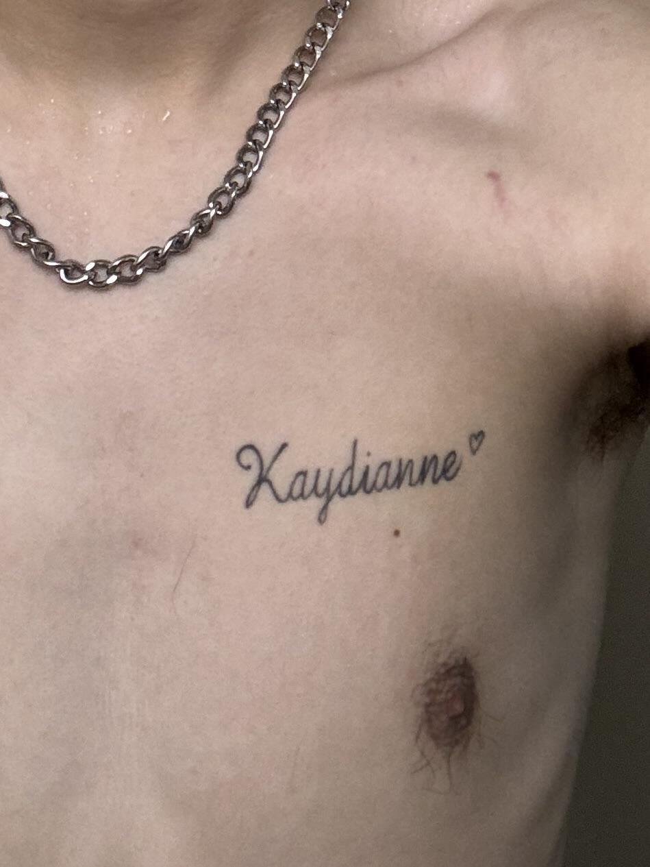 chest name tattoos for men 0044