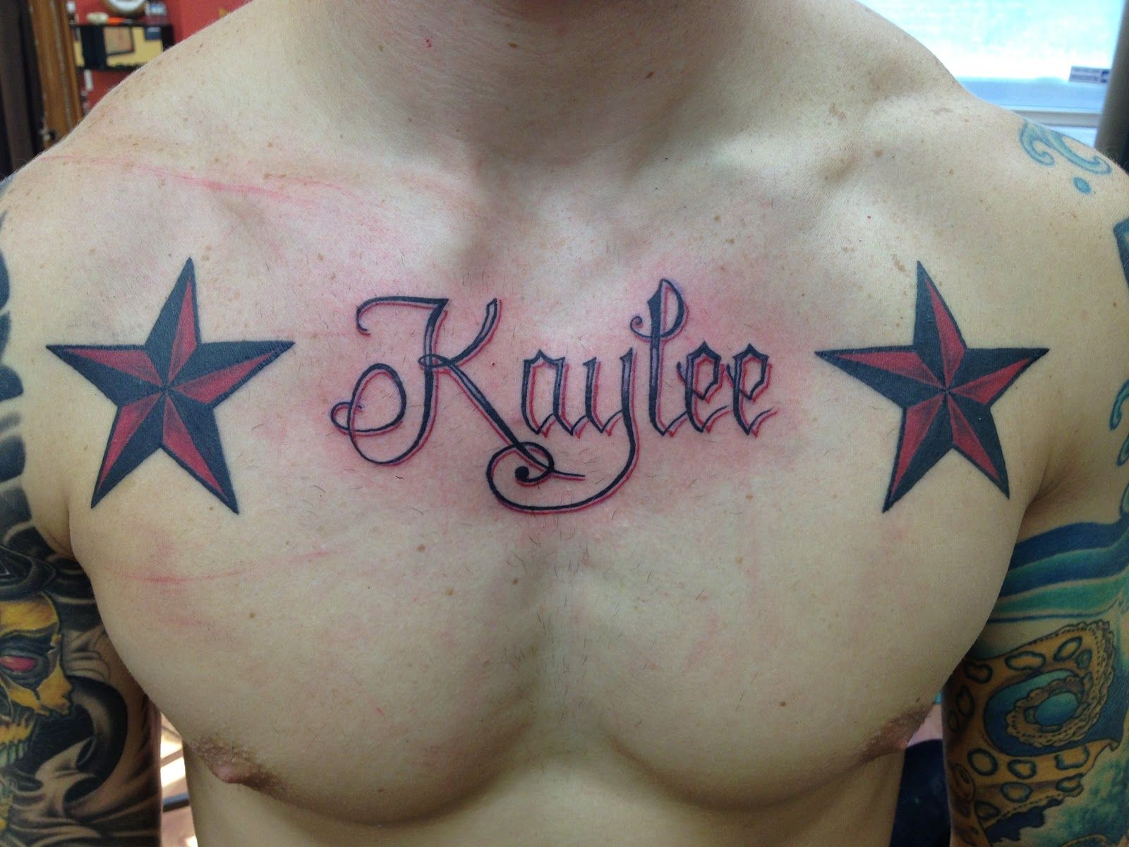 chest name tattoos for men 0094