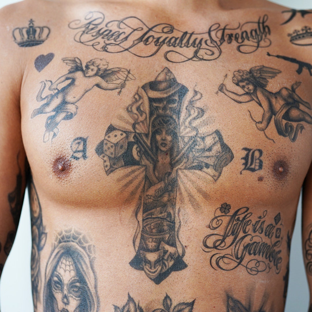 Chicano chest tattoos for men placement tips