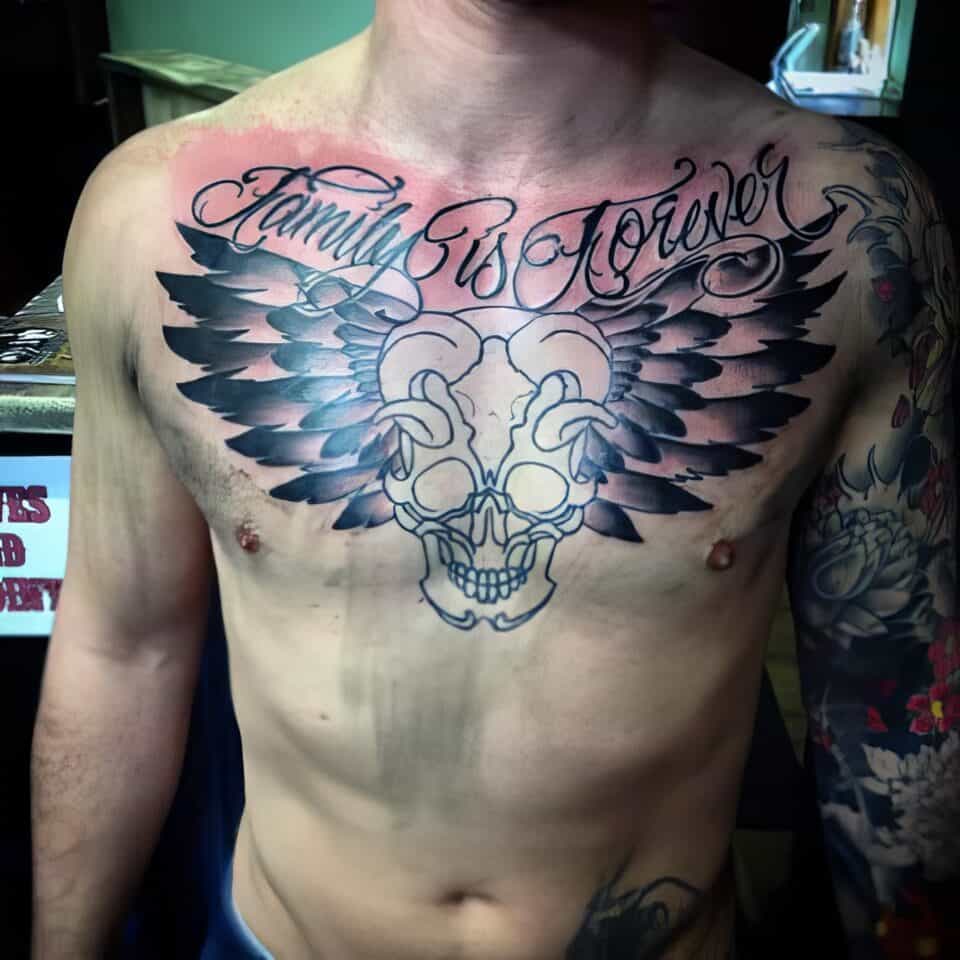 choosing meaningful family chest tattoos for men