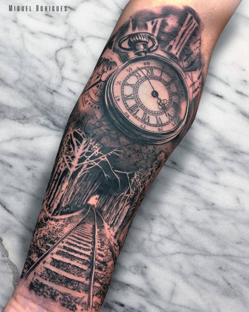 clock inner forearm tattoos for men 0034