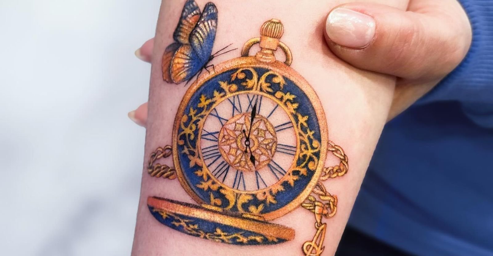 clock inner forearm tattoos for men 0087