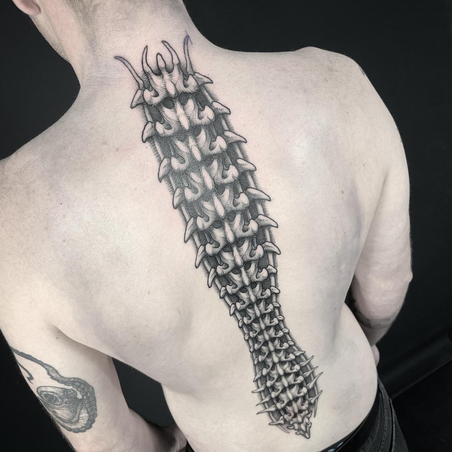 cool spine tattoos for men