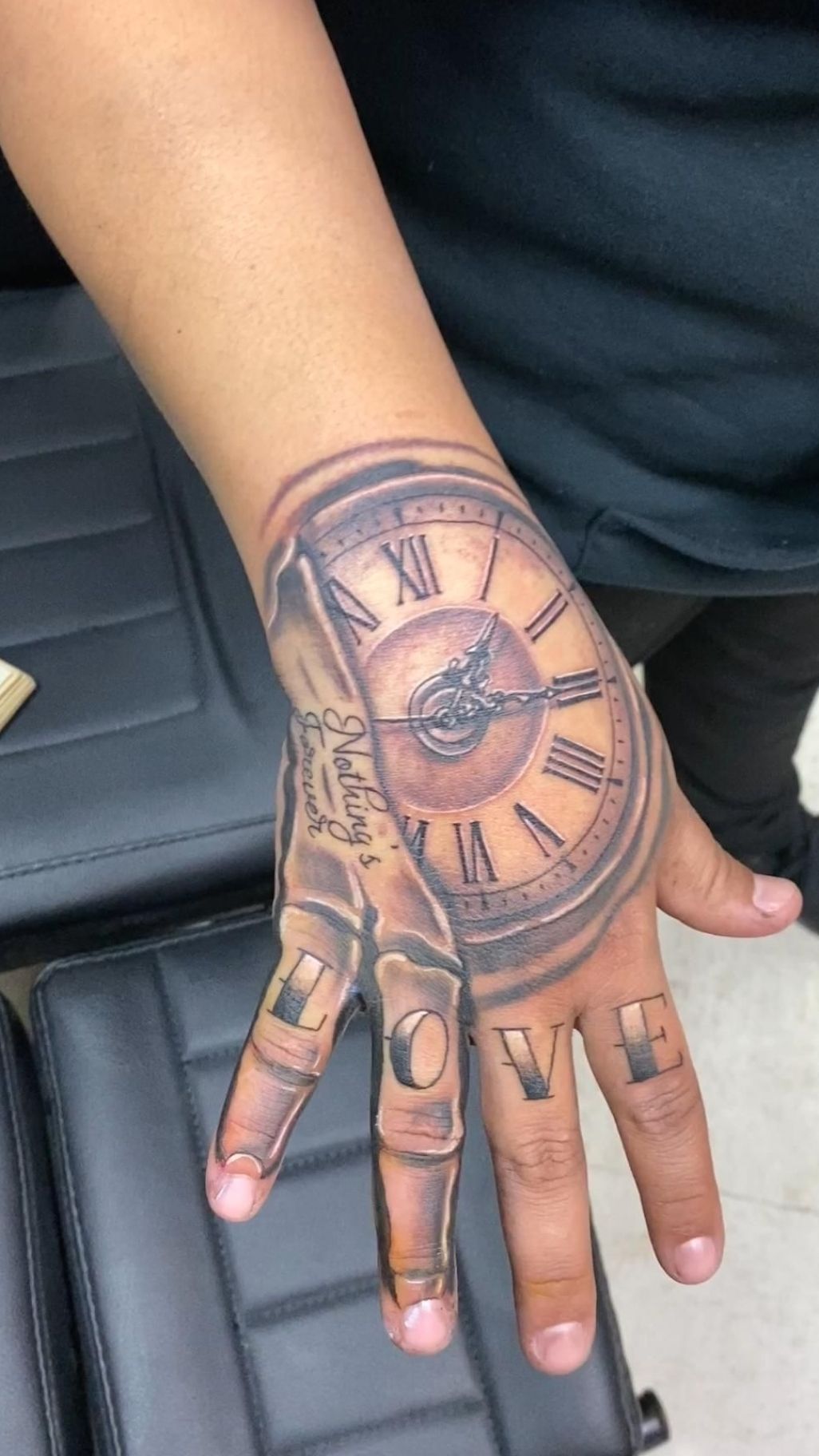 creative clock tattoos for men on hand styles