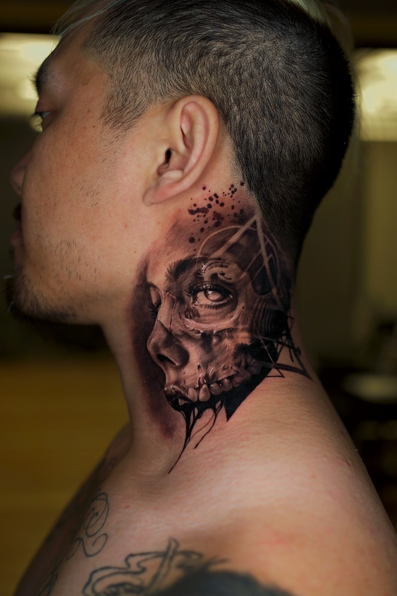 creative neck skull tattoos for men