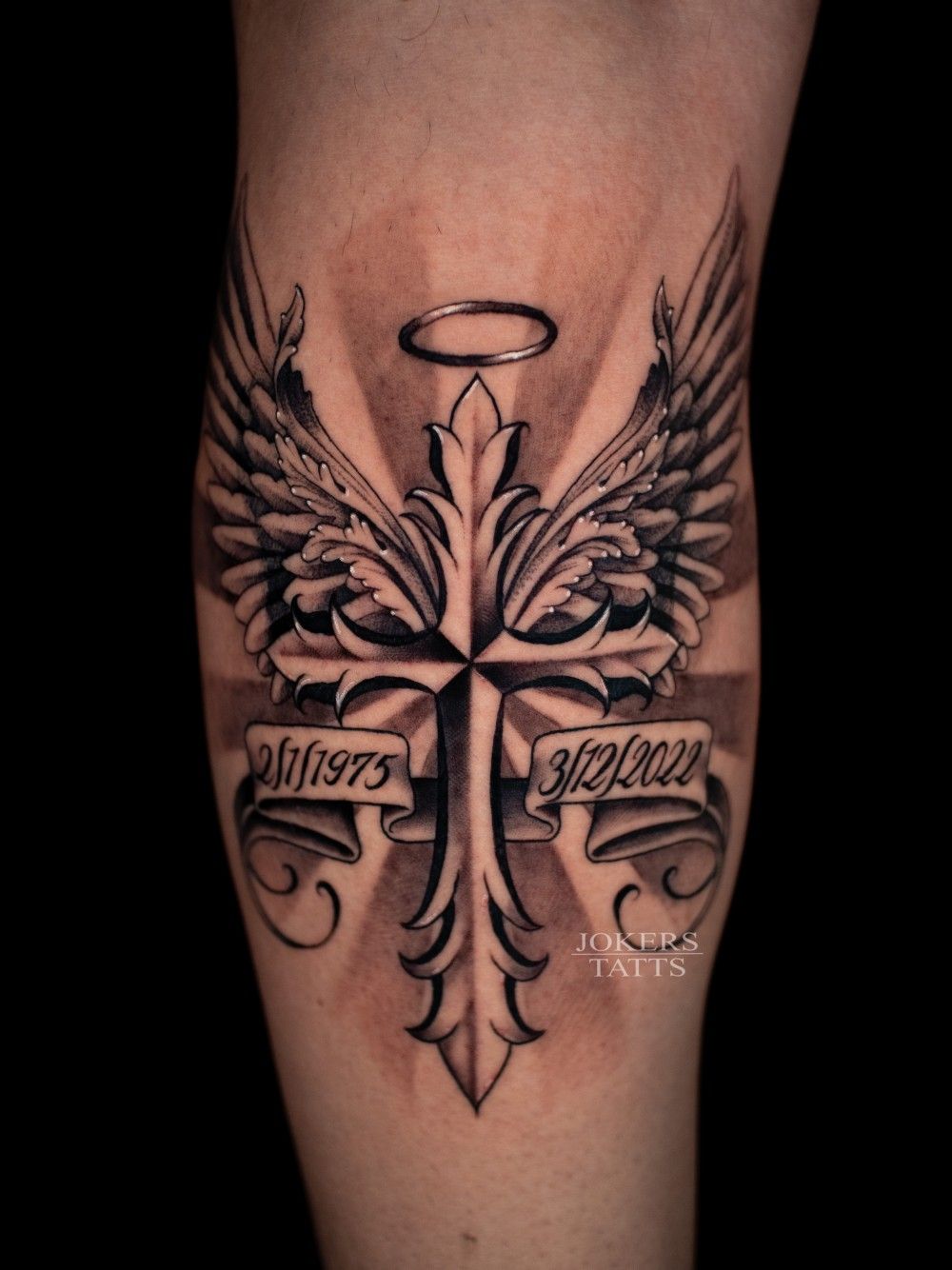 Cross with wings tattoo designs for men