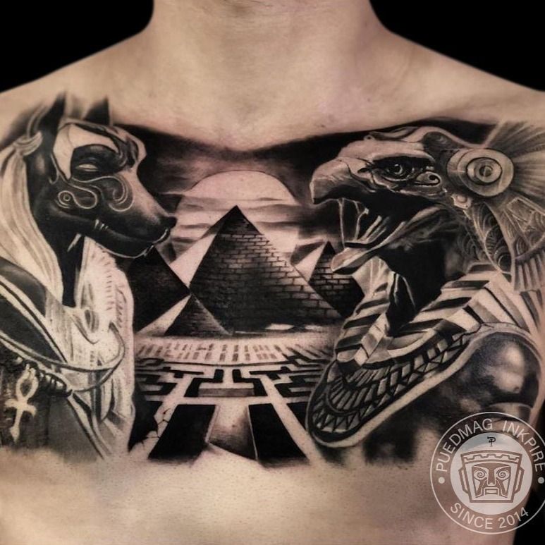 cultural significance of black Egyptian chest tattoos for men