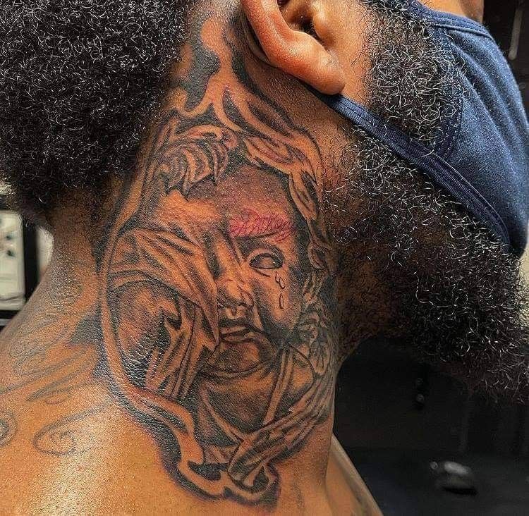 cultural significance of neck tattoos for black men