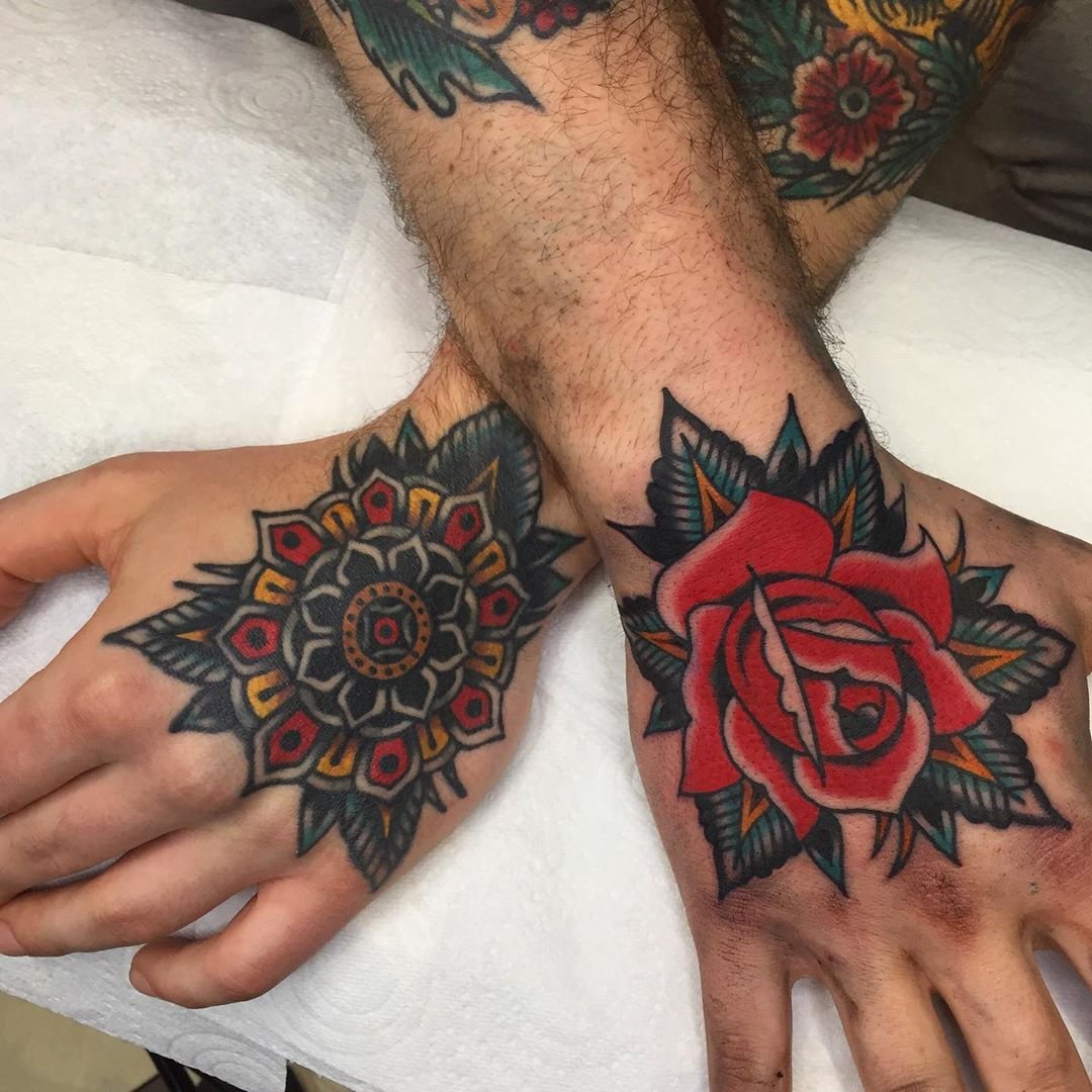 cultural significance of traditional hand tattoos for men