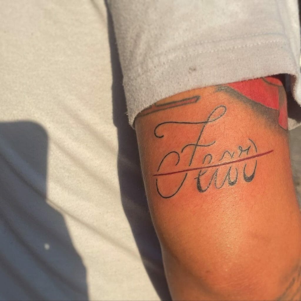 cursive tattoos for men 0058