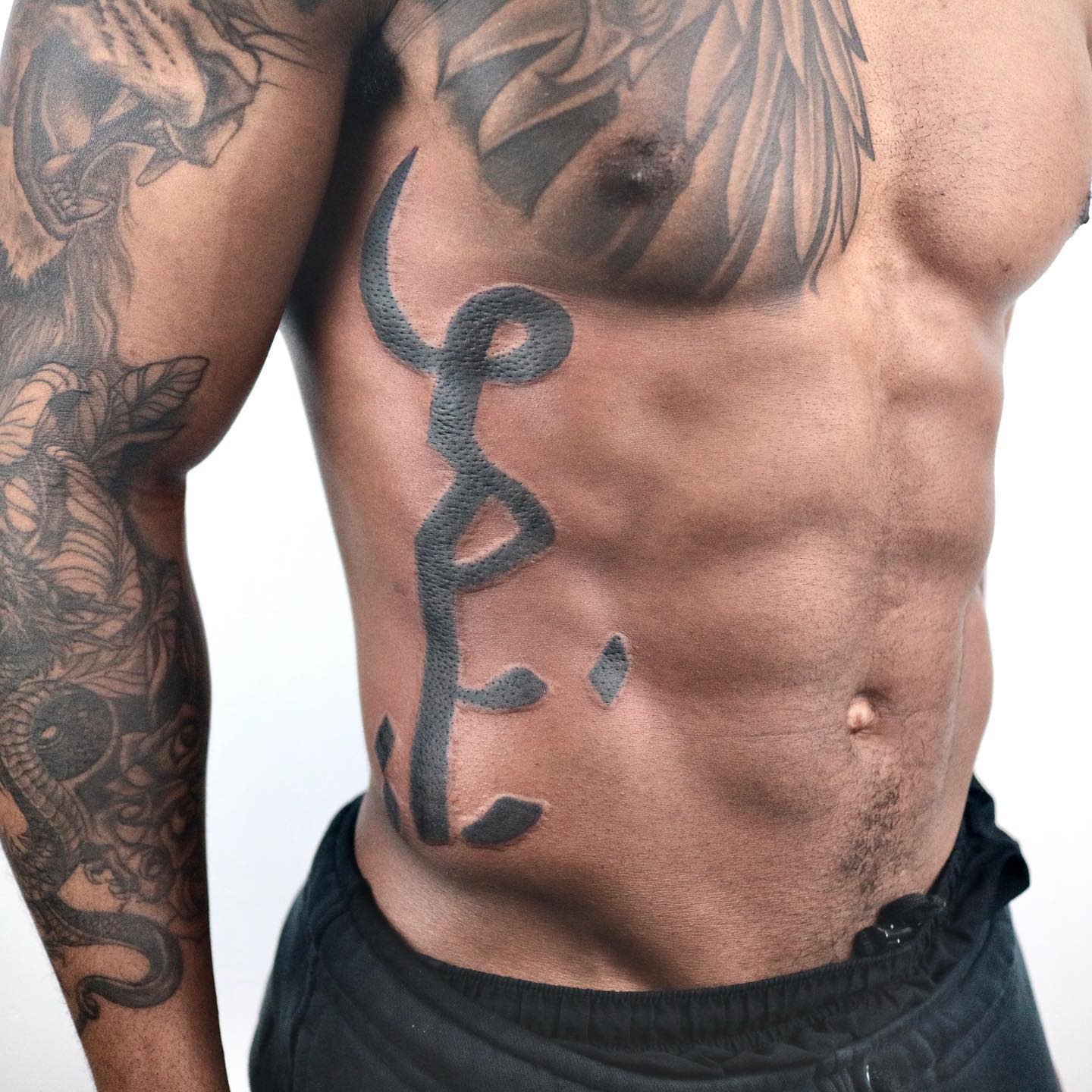 cursive tattoos for men 0095