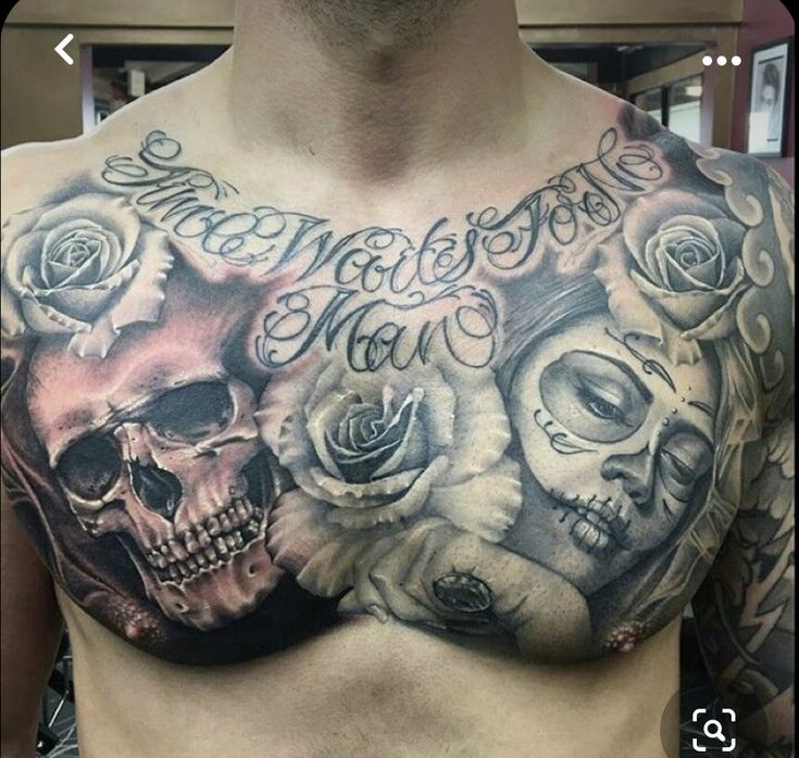 dark themed skull tattoos for men on chest.