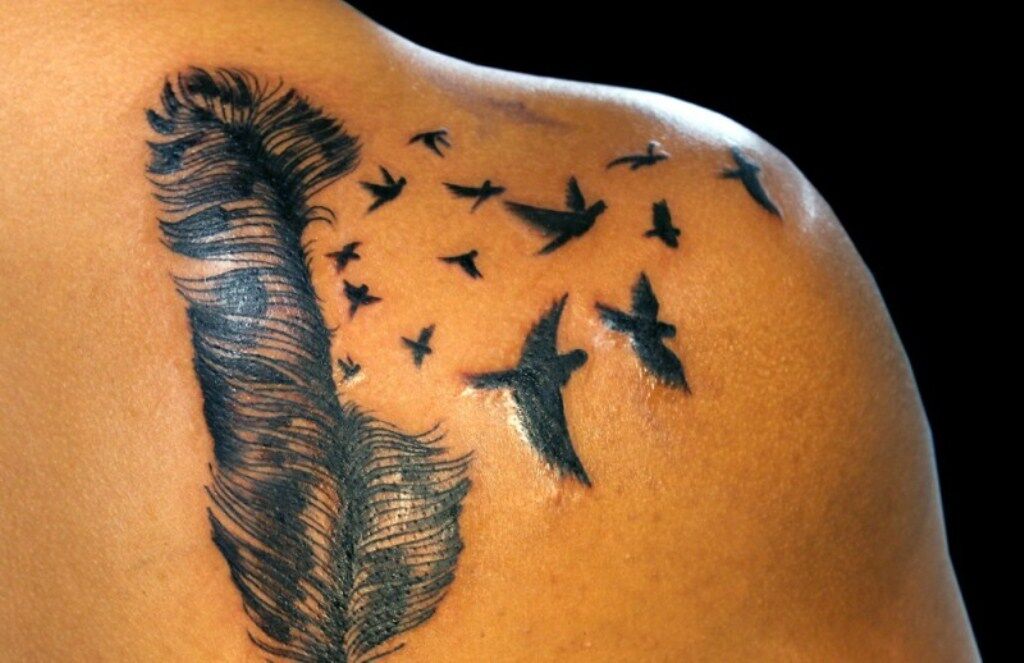 feather tattoos for men 0062