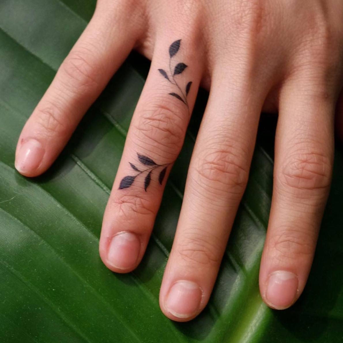 finger tattoos for men 0056