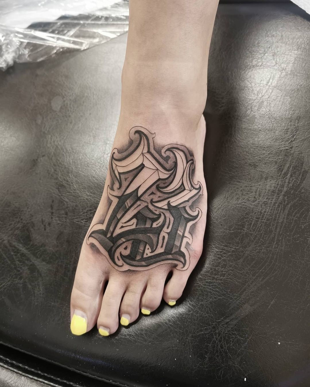 foot tattoos for men 0029