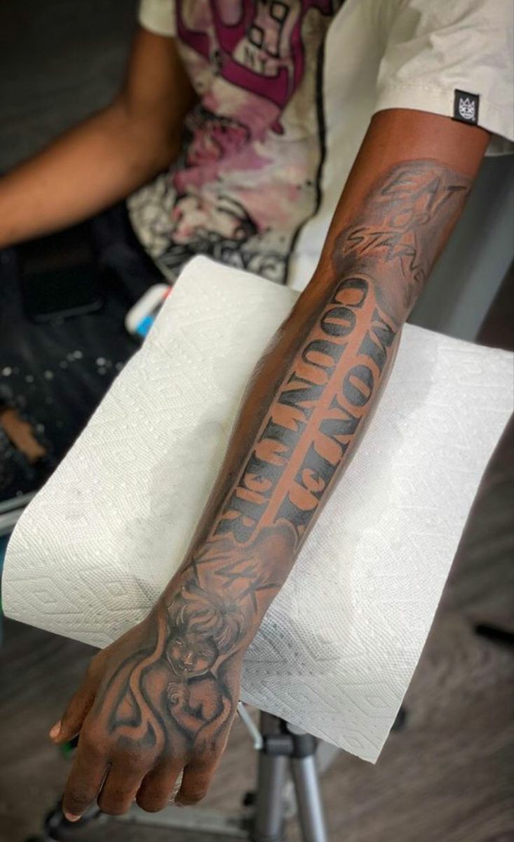 upper sleeve tattoo ideas for black men 0019