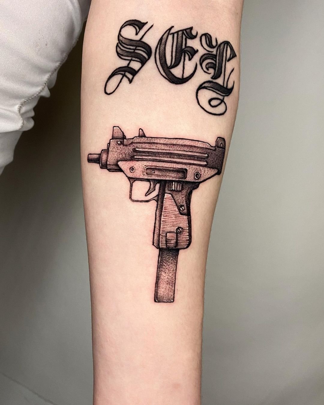 gun tattoos for men 0010